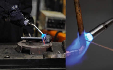 A welding torch emits a blue flame onto a metal object, held by a gloved hand, on a workbench in an industrial setting. Another view shows a flame heating a pipe.