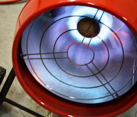 A close up of a Bromic Heat-FloTM LPG Blow Heater turned on