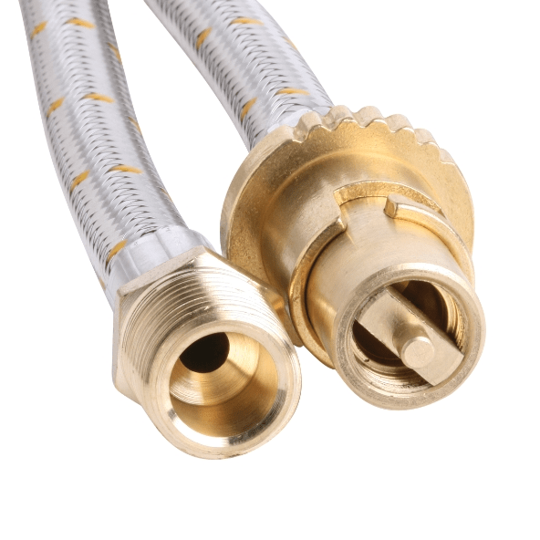 A braided metal hose with brass fittings on both ends lies coiled. The background is plain white, emphasizing the hose’s metallic sheen and textured connectors.