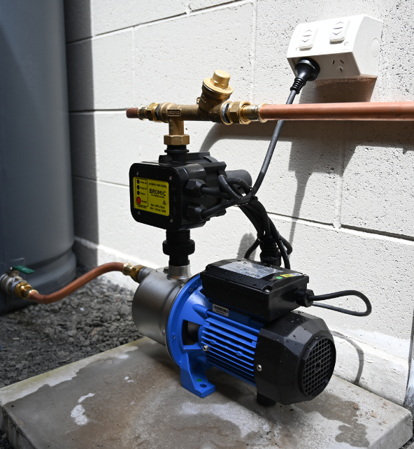 rains to mains pump installed in an outdoor setting